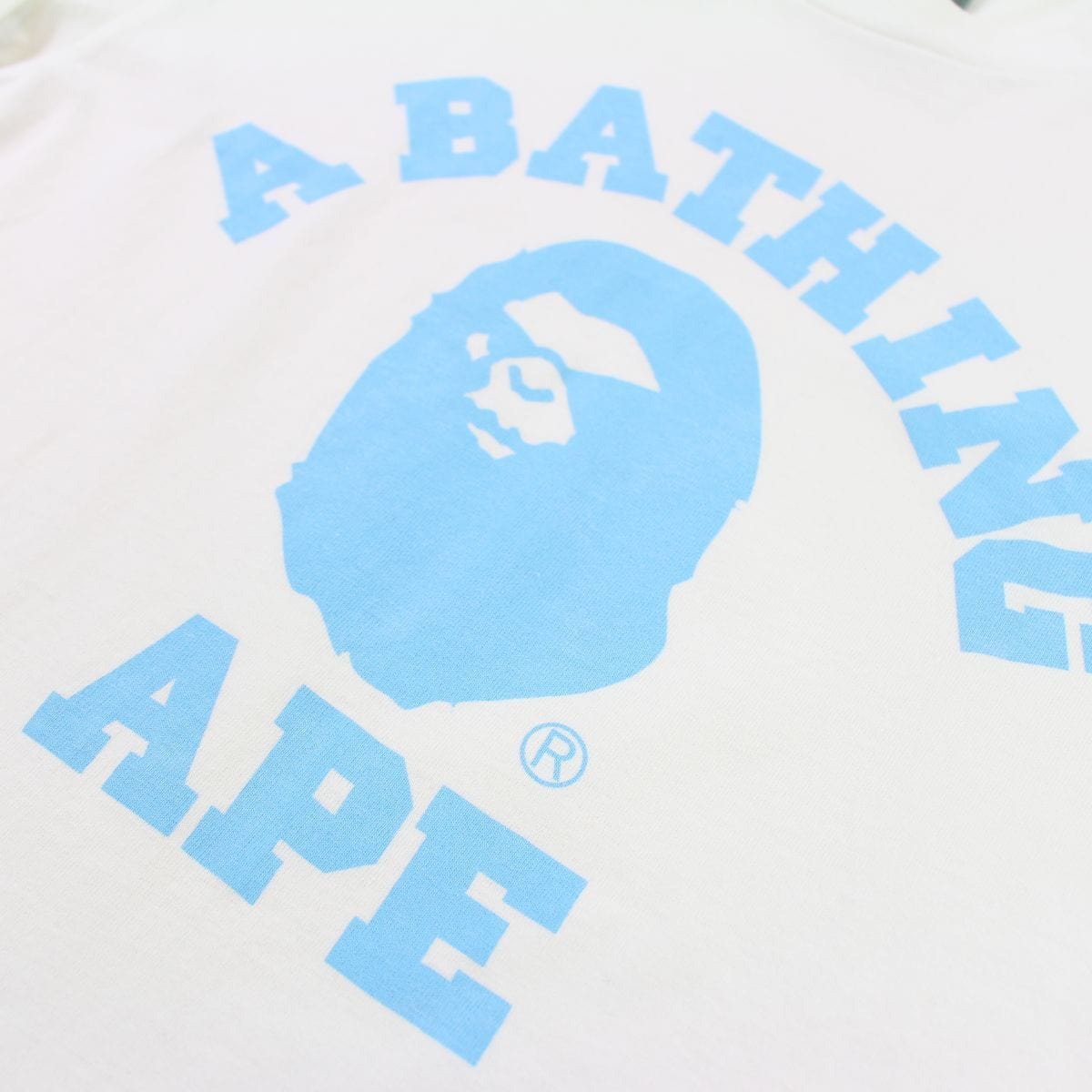 Bape Baby Blue Angry Face College Logo LS White - SaruGeneral