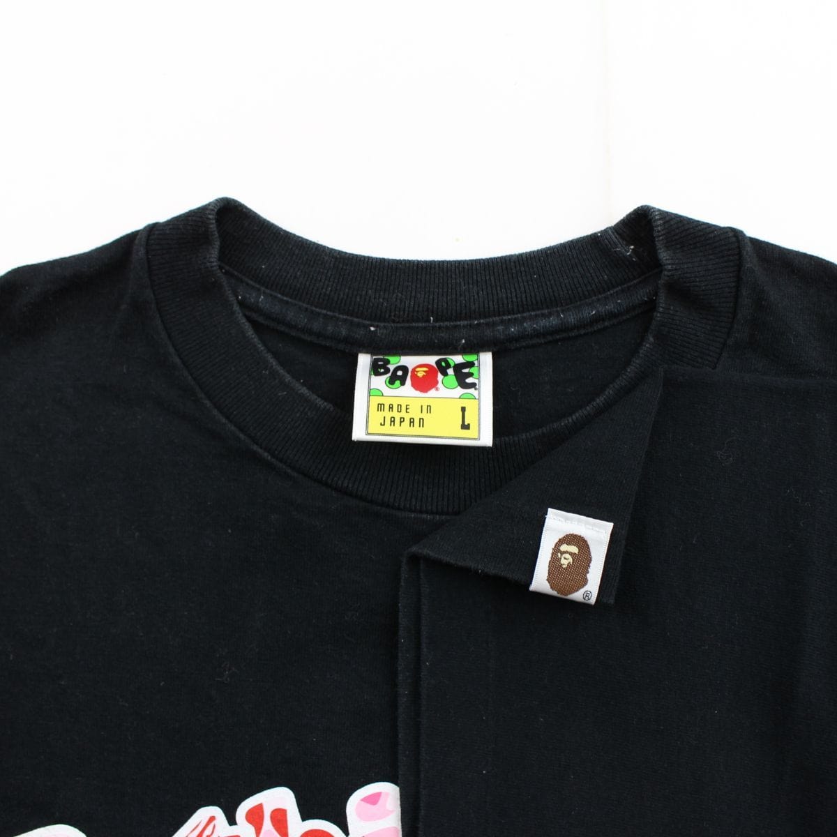 Bape Pink Camo Bathing Ape Text Tee Black - SARUUK