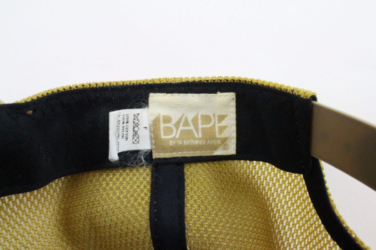 Bape x Kaws 1st Yellow Camo Truker Hat - SaruGeneral