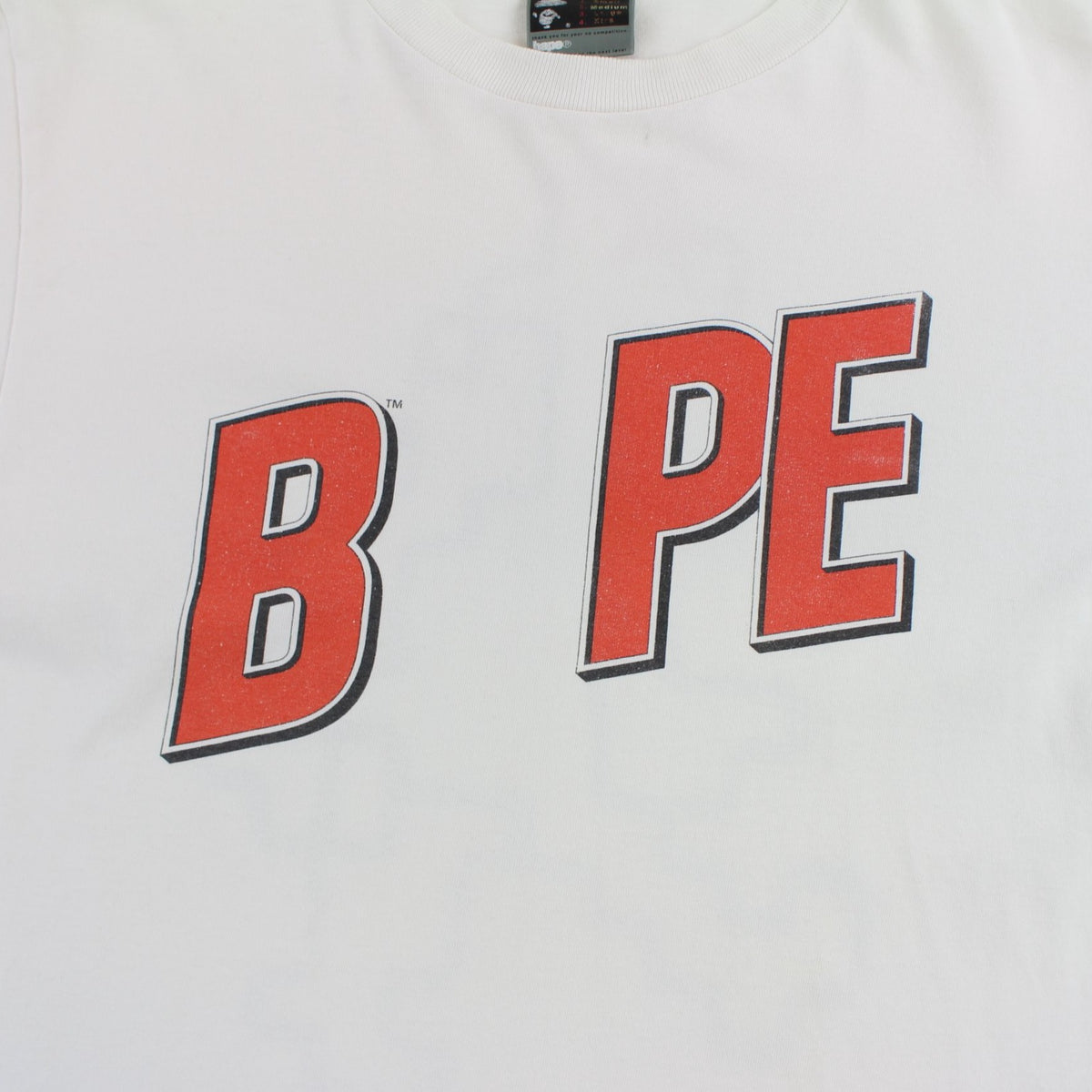 Bape Bapesta puzzle dino Text Logo Tee White - SARUUK