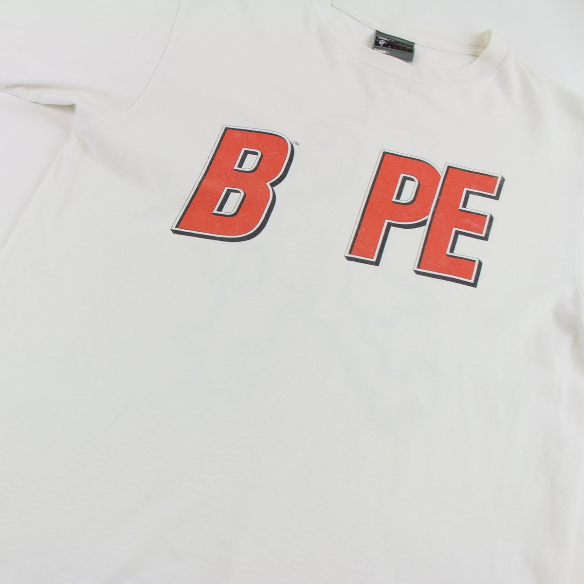 Bape Bapesta puzzle dino Text Logo Tee White - SARUUK
