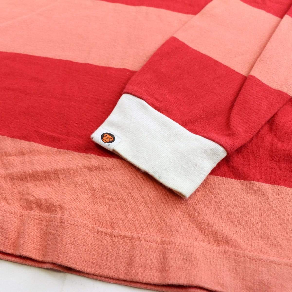 Bape baby milo peach stripe rugby shirt - SaruGeneral
